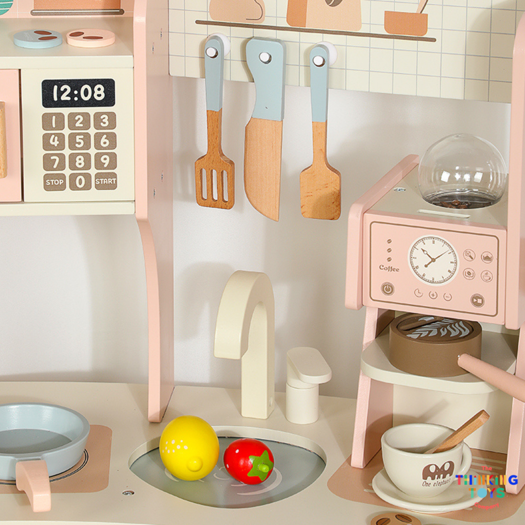 KP011, PLAYSHOP Cassey Corner Kitchen with Laundry, The Playshop Corner Kitchen with Laundry is a 2-in-1 pretend play set designed for little homemakers. With a compact corner design, it features a cooking station and a mini laundry area, encouraging kids to explore both cooking and cleaning through play. This wooden playset promotes creativity, role play, and independence, helping children understand everyday routines while having fun. Perfect for small spaces, it blends durability and child-safe design fo