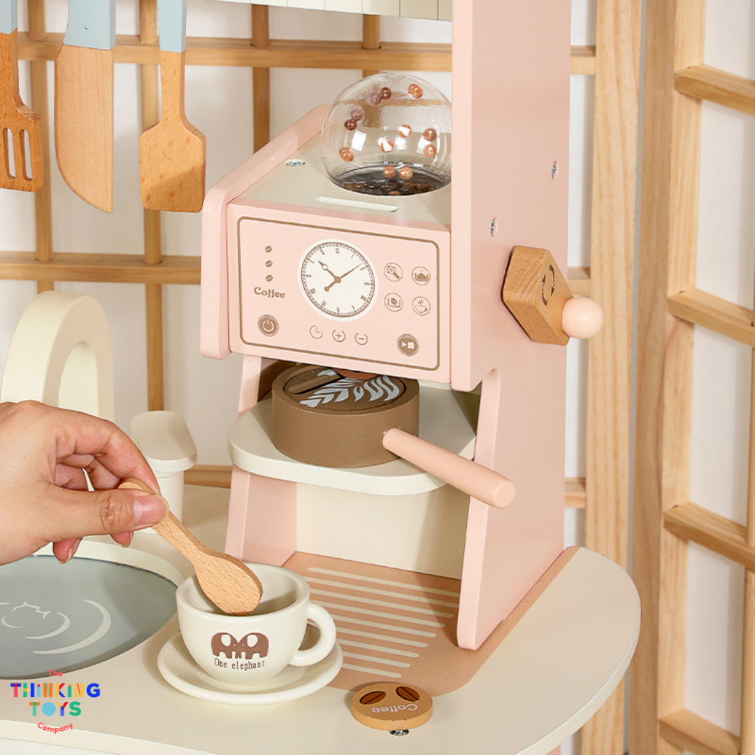 KP011, PLAYSHOP Cassey Corner Kitchen with Laundry, The Playshop Corner Kitchen with Laundry is a 2-in-1 pretend play set designed for little homemakers. With a compact corner design, it features a cooking station and a mini laundry area, encouraging kids to explore both cooking and cleaning through play. This wooden playset promotes creativity, role play, and independence, helping children understand everyday routines while having fun. Perfect for small spaces, it blends durability and child-safe design fo