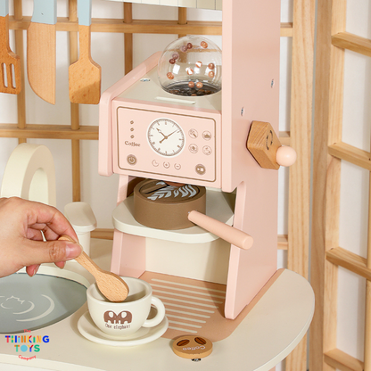 KP011, PLAYSHOP Cassey Corner Kitchen with Laundry, The Playshop Corner Kitchen with Laundry is a 2-in-1 pretend play set designed for little homemakers. With a compact corner design, it features a cooking station and a mini laundry area, encouraging kids to explore both cooking and cleaning through play. This wooden playset promotes creativity, role play, and independence, helping children understand everyday routines while having fun. Perfect for small spaces, it blends durability and child-safe design fo